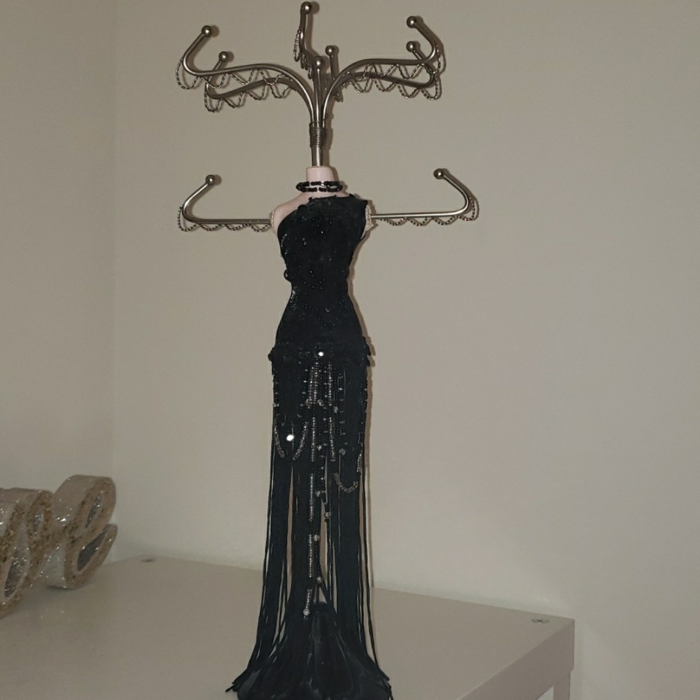 Earring and necklace holder